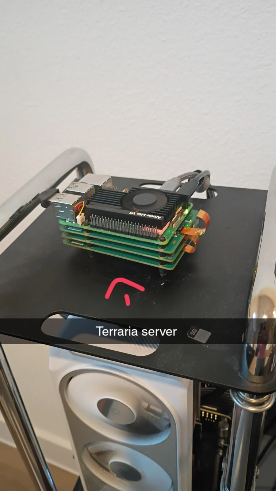 A stack of colorful fabricated parts on a workbench